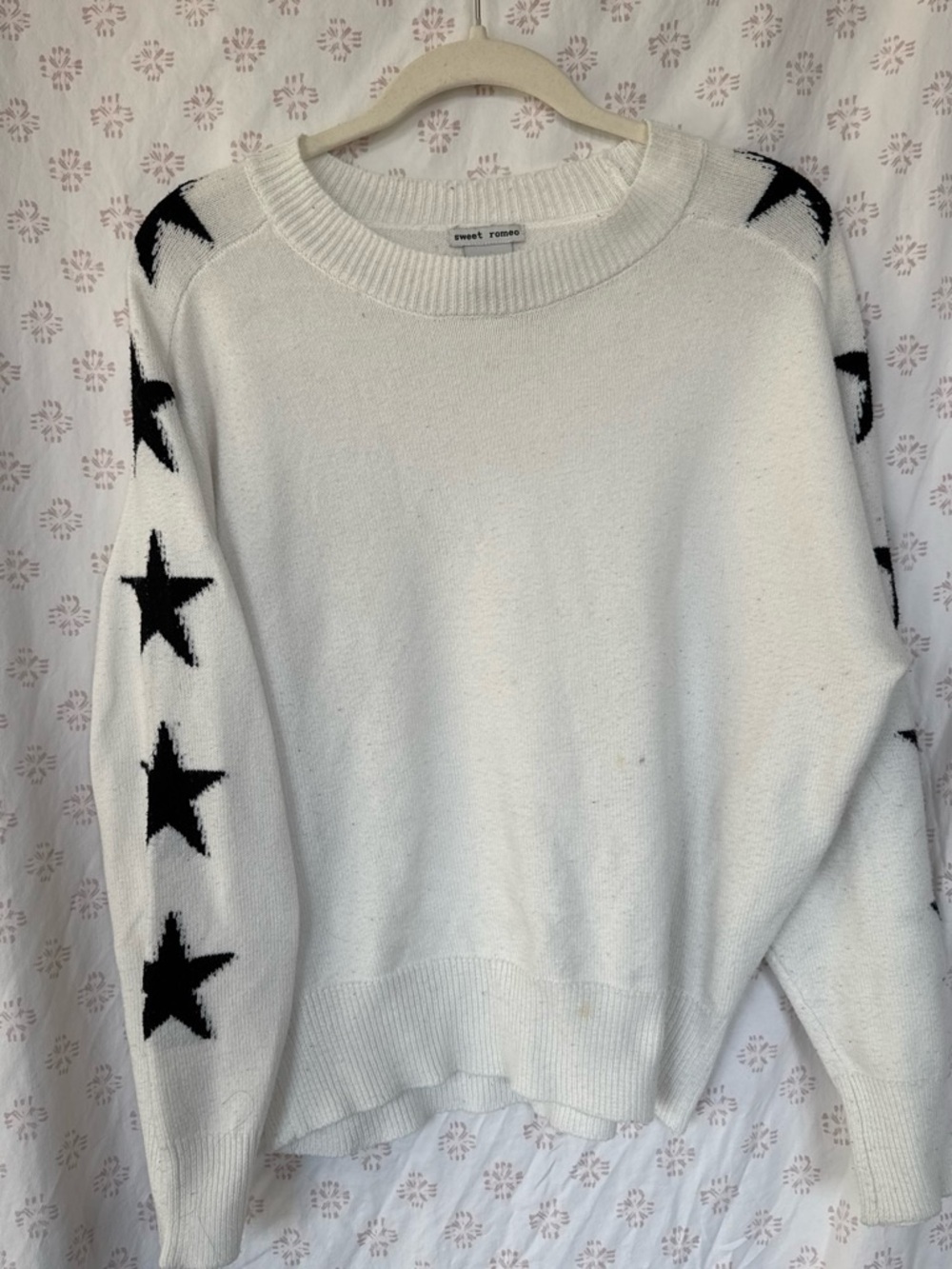 Sweet Romeo Cream Crewneck Sweater with Black Star Sleeves
